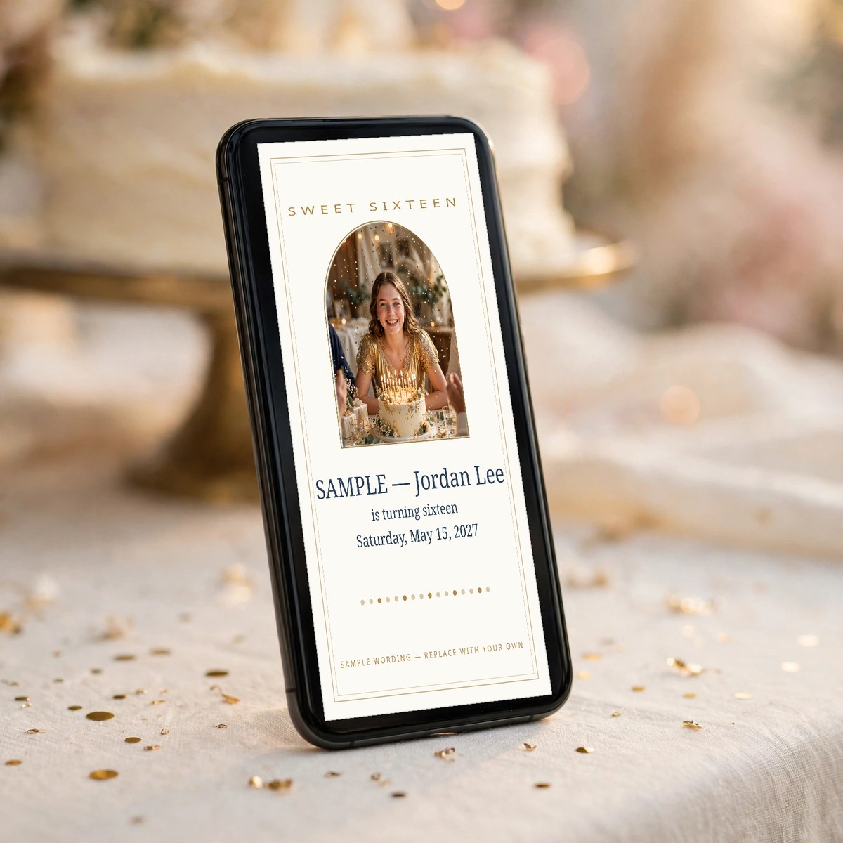 Hand holding a phone showing a Sweet 16 announcement card with a smiling sixteen-year-old's photo and gold Sixteen lettering, friends celebrating behind